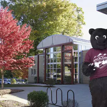Trailblazer bear in front of Bailey building