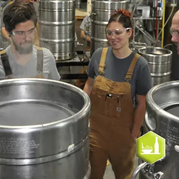 Brewing students near brewing station