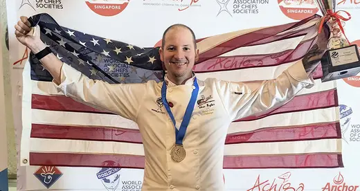 Chris Bugher, executive chef instructor at A-B Tech Community College, won the gold medal and trophy and the title of Global Vegan Chef of the Americas in the Worldchefs Global Chefs Challenge Regional Semi-Final in Santiago, Chile in South America