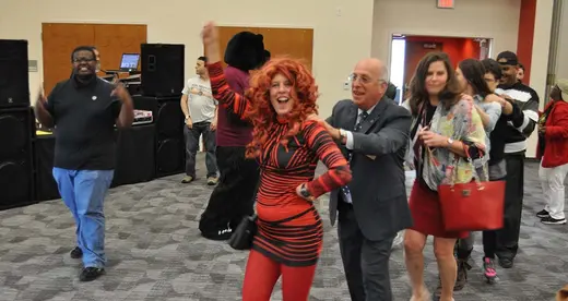 Line of people dancing