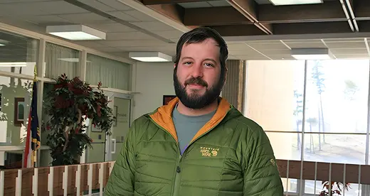 Nick Long standing in hallway