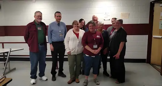 A group of A-B Tech employees at Owen Middle School
