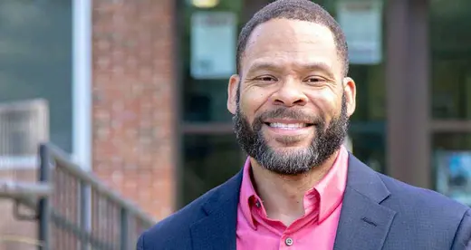 Duane Adams standing outside