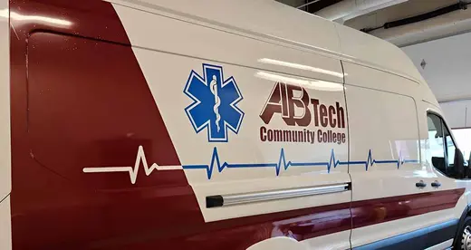An ambulance with the A-B Tech logo