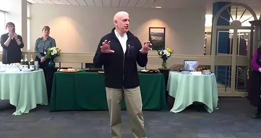 Ron Layne standing in front of group