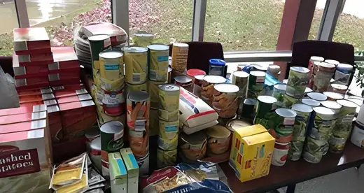 Boxes and cans of food on a table