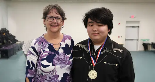 Sam Thompson with his mom.