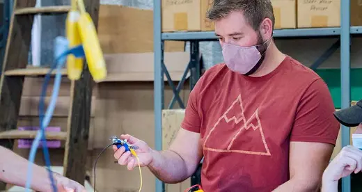 Man working in air, heating lab