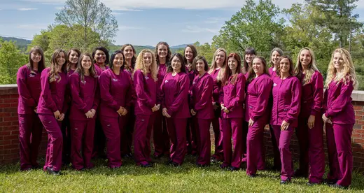 Group of Dental Hygiene students in caps and gowns