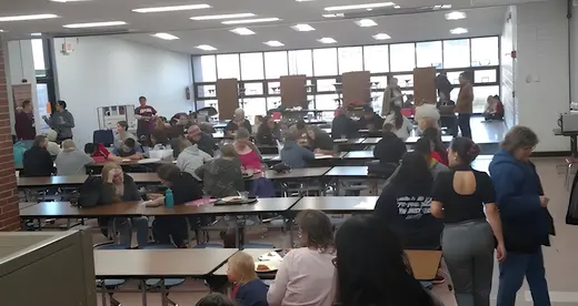 People in a school cafeteria