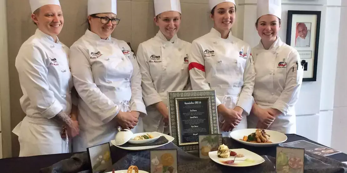 A-B Tech’s Student Culinary Team with their winning plates at the American Culinary Federation’s Southeast Regional Competition. Members of the team are, from left, Emma Wieber, Habiba Smallen, Nina Patterson, Jessica Olin, and Emily Welch.