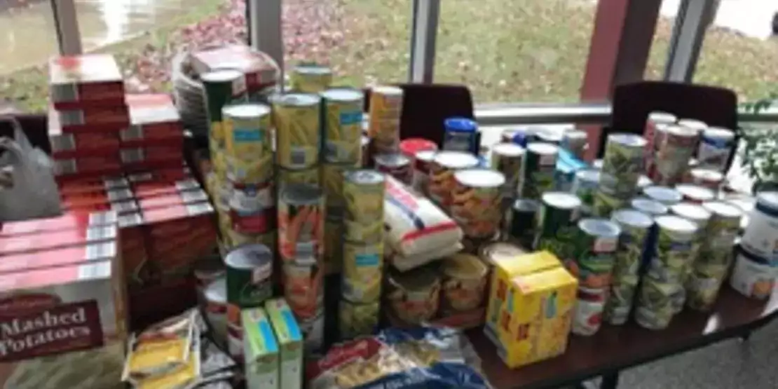 Boxes and cans of food on a table