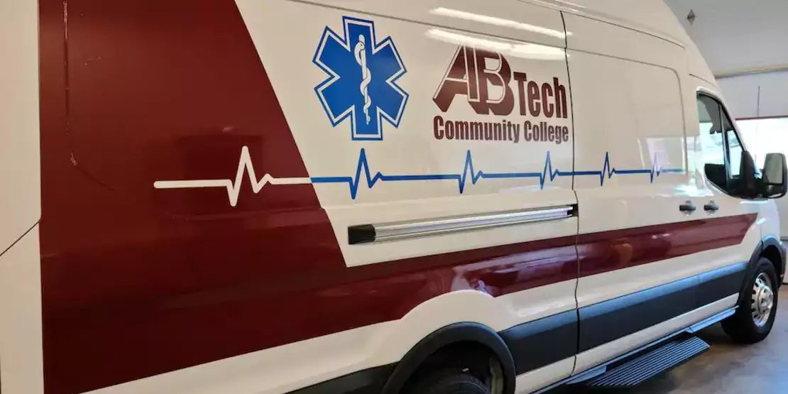 An ambulance with the A-B Tech logo