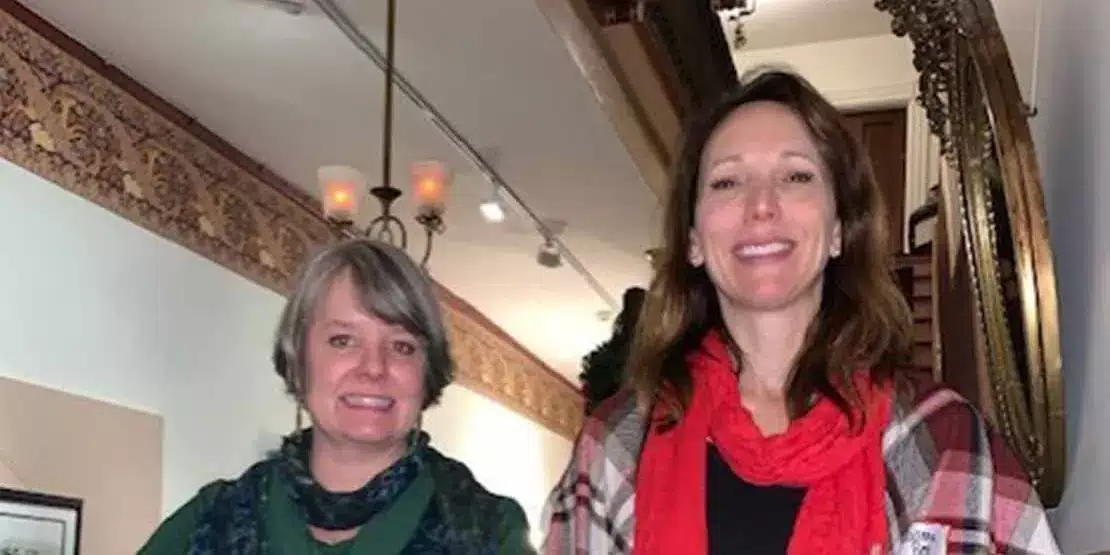 Two women on a staircase