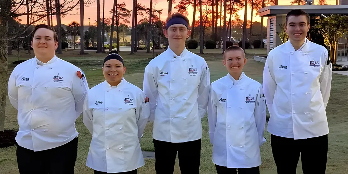 A-B Tech’s 2025 student culinary team members are (l to r): Jack Ramsey, Carolina Salas, Ezrah Hanson (captain), Martin Deyman and Josh Jimison. The team coach is Chef Chris Bugher, CEC.