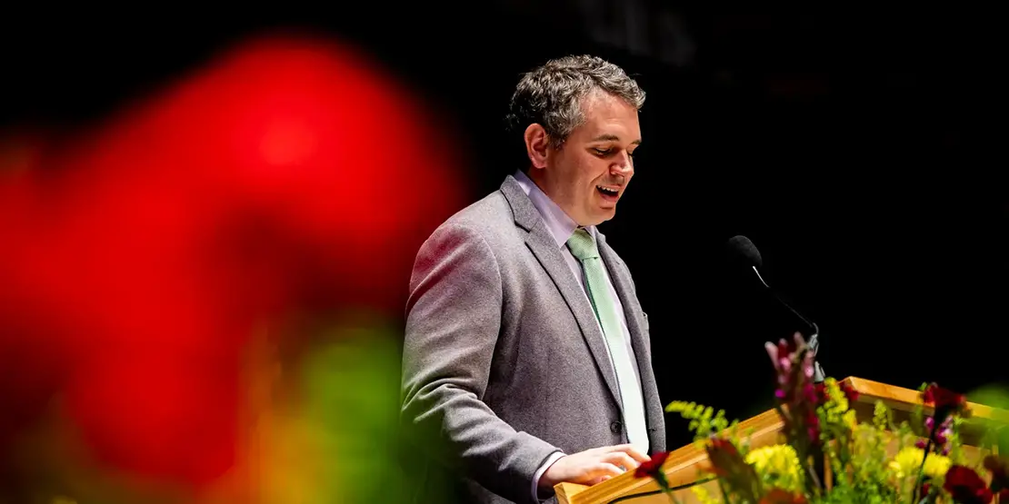 Nation Hahn delivers the commencement address inside Harrah's Cherokee Center during A-B Tech's graduation ceremony, May 10, 2025, in Asheville.