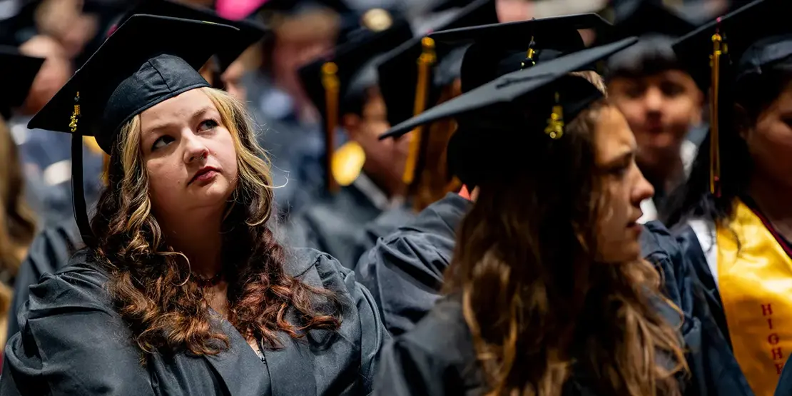 A-B Tech graduates sit inside Harrah's Cherokee Center during the university's graduation ceremony, May 10, 2025, in Asheville.