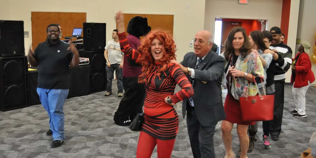 Line of people dancing