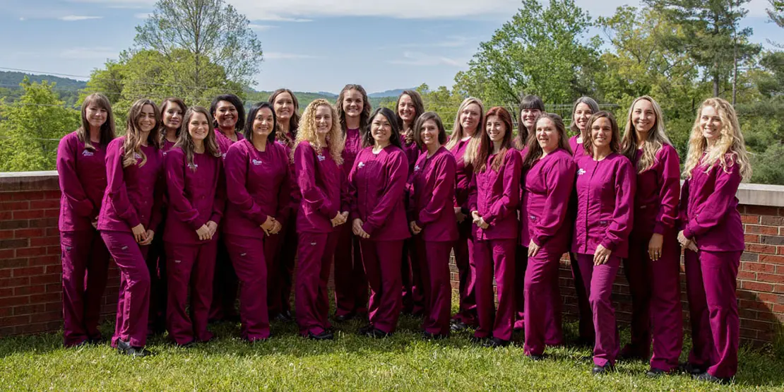 Group of Dental Hygiene students in caps and gowns