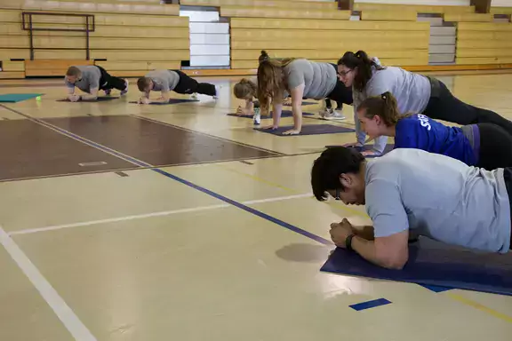 Students exercising in the health and fitness program