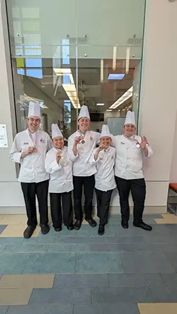 A-B Tech’s 2025 student culinary team placed first in regional American Culinary Federation competition with competitors Jack Ramsey, Carolina Salas, Ezrah Hanson (captain), Martin Deyman and Josh Jimison, who were coached by Chef Chris Bugher, CEC.