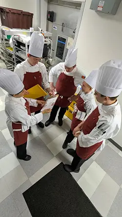 A-B Tech’s 2025 student culinary team placed first in regional American Culinary Federation competition with competitors Jack Ramsey, Carolina Salas, Ezrah Hanson (captain), Martin Deyman and Josh Jimison, who were coached by Chef Chris Bugher, CEC.