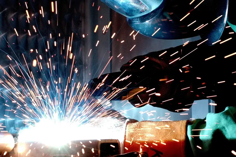 Student welding using an mig welder