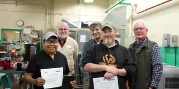 Five men in an HVAC shop