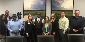 Group photo of Charlotte Works and members of the Sheriff's Office