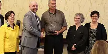 CBI Director Jeff Irvin, second from left, with (from left) CCA Executive Director Dr. Anne McNutt, CCA President Dr. John Boyd, and A-B Tech Vice Presidents Dr. Beth Stewart and Dr. Shelley White.