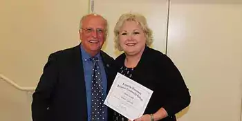 Brinda Caldwell and Dennis King standing together