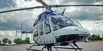 Helicopter on asphalt parking lot