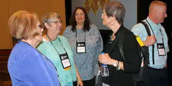 Four women standing