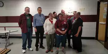 A group of A-B Tech employees at Owen Middle School