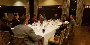 Students at a dinner table