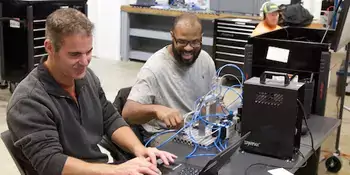 Two men in an industrial maintenance class