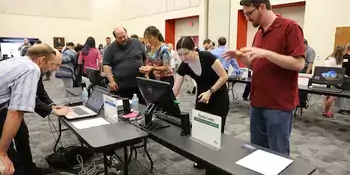 Students looking at a computer