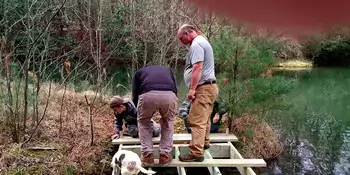 Students building a dock