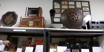 Antique radios on shelves
