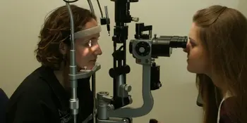 Woman having her eyes examined