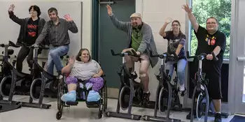 SOAR Students in class on exercise equipment