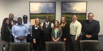 Group photo of Charlotte Works and members of the Sheriff's Office
