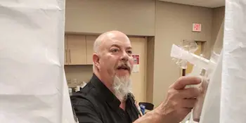 Anthony Green fitting face masks