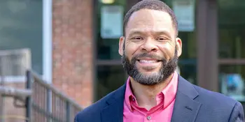 Duane Adams standing outside