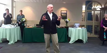 Ron Layne standing in front of group