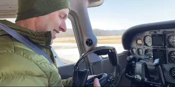 Timothy McBride in a plane (Melody Greene/Spectrum News 1)