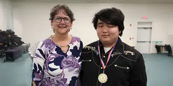 Sam Thompson with his mom.