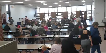People in a school cafeteria