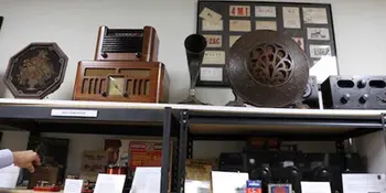 Antique radios on shelves