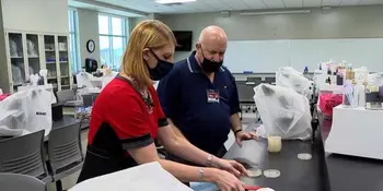 Dr. Wiener and Jennifer Emert from WLOS testing masks